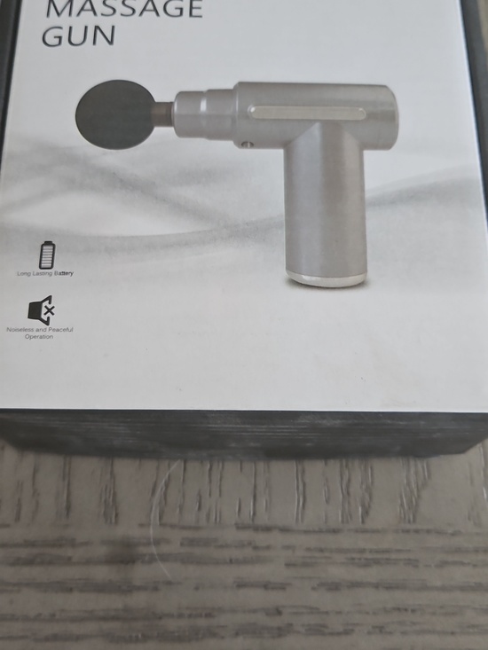 Portable Black Massage Gun with Yellow Accent - Picture 2 of 4